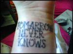 tomarrow-never-knows-misspelled-tattoo